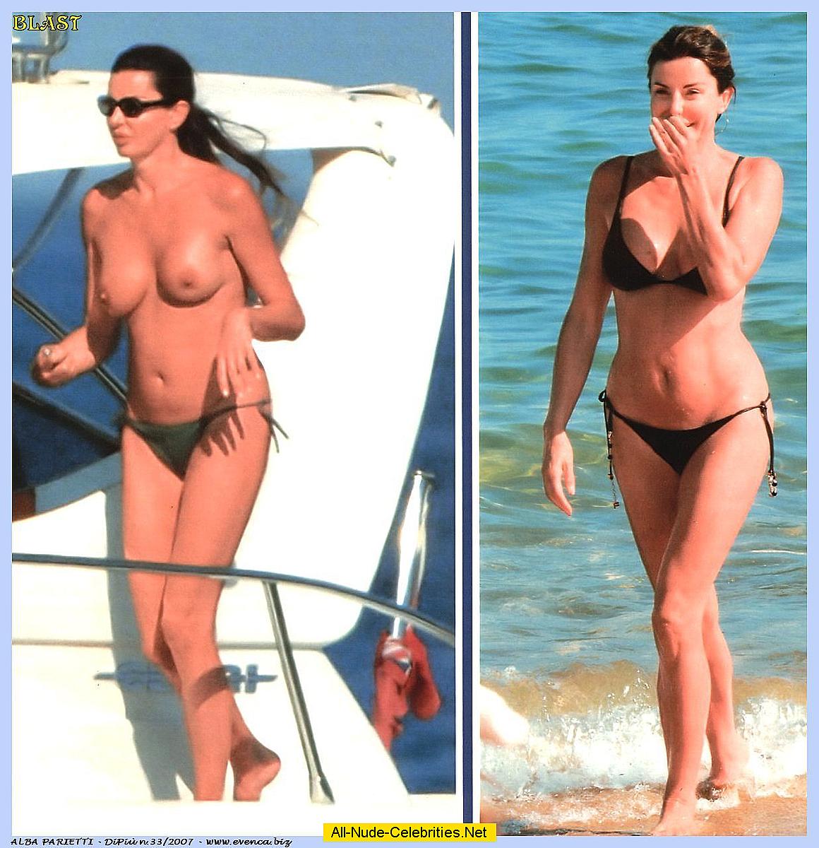 Alba Parietti topless on the beach and yacht paparazzi shots